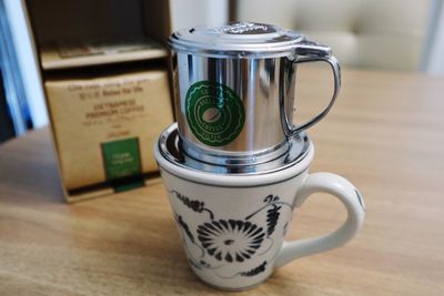 Close-up of coffee cup on table