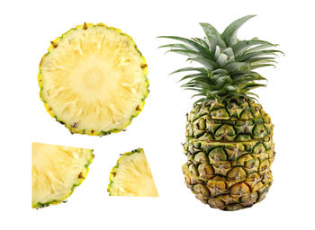 Close-up of fruits against white background