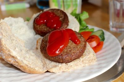 Close-up of burgers on plate