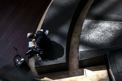 Close-up of man using mobile phone