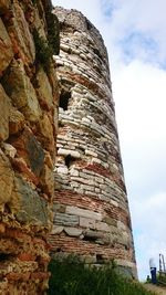 Low angle view of old building against sky