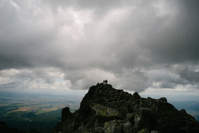 Rock formations on mountain against sky