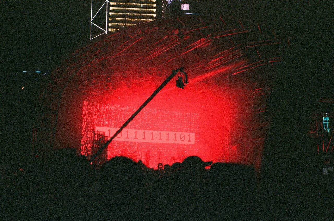 SILHOUETTE OF ILLUMINATED RED STRUCTURE