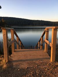 View of bridge over lake against clear sky