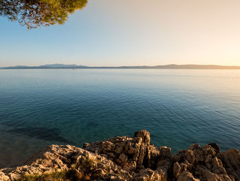 Scenic view of sea against clear sky