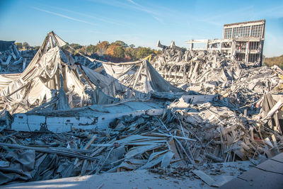 View of abandoned building on snow covered land