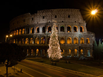 Illuminated christmas tree at night in rome