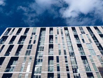 Low angle view of modern building against sky