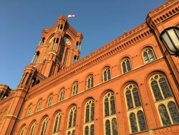 Low angle view of building against blue sky