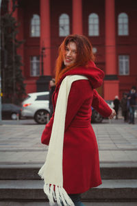 Close up attractive woman with white scarf on street portrait picture