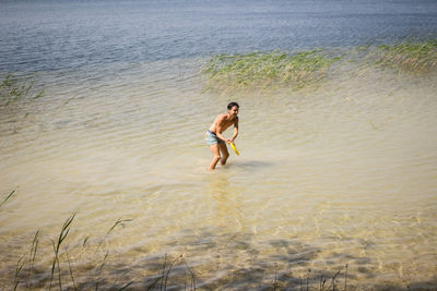 Full length of man on beach