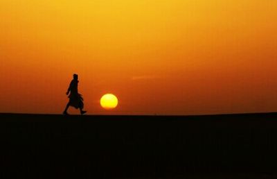 Scenic view of sunset over sea