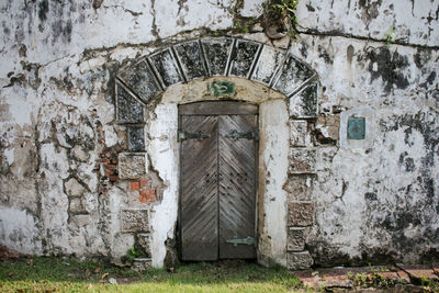 Closed door of abandoned building