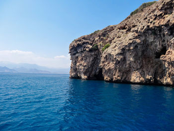 Scenic view of sea against blue sky