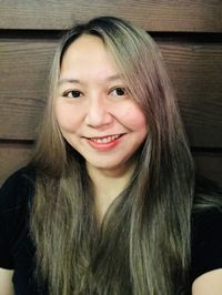 Portrait of a smiling young woman