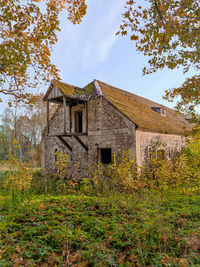 Low angle view of old building against sky