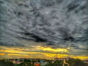 Silhouette of city at sunset