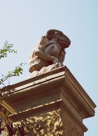 Low angle view of statue against clear sky