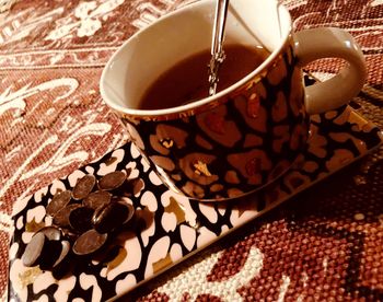 Close-up of coffee cup on table