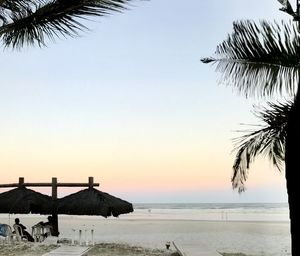 Scenic view of sea against sky at sunset