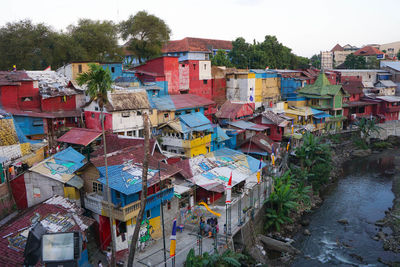 Multi colored houses against sky