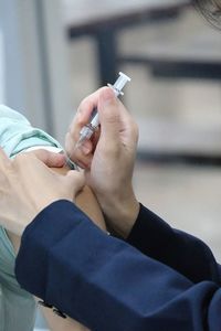 Close-up of woman holding hands