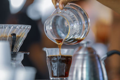 Close-up of drink in glass jar on table