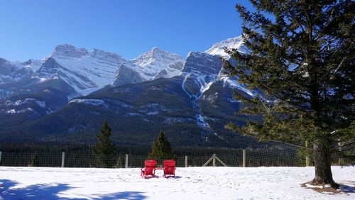 Scenic view of snowcapped mountains against sky