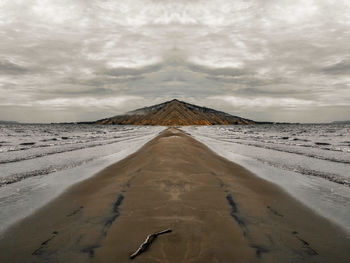 Scenic view of desert against sky