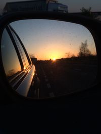 Reflection of sky on side-view mirror