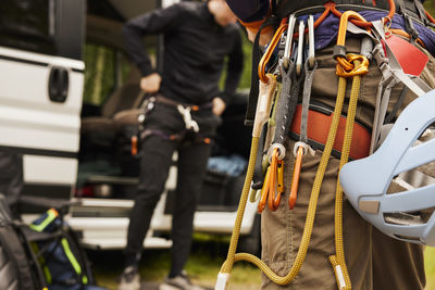 Rock climbers putting gear on