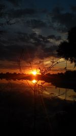 Scenic view of sunset over river