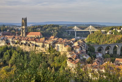 Cathedral of st. nicholas, new poya and old zaehringen bridge, fribourg, switzerland