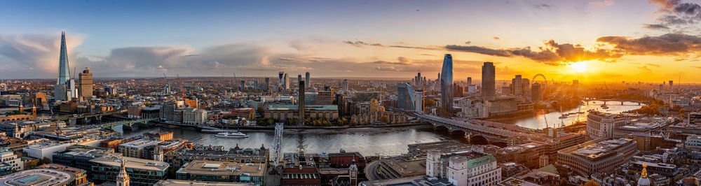 High angle view of buildings against sky during sunset