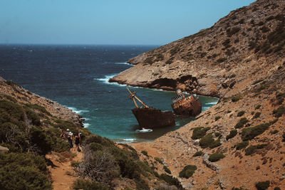 Scenic view of a shipwreck and sea against sky