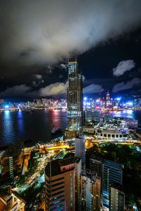 High angle view of illuminated modern buildings in city at night