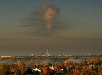 Distant factory against sky in poland