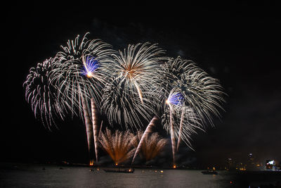 Firework display at night