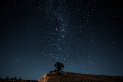 Low angle view of stars in sky at night