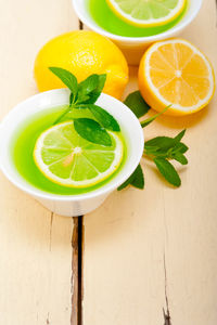 Directly above shot of sliced lemons on table
