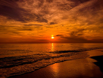 Scenic view of sea against sky during sunset