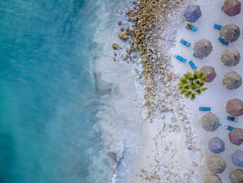 High angle view of rock in sea