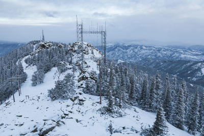 Communication towers and power lines on squaw mountain, colorado