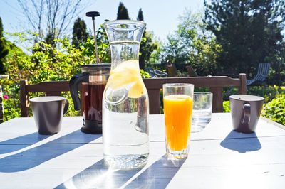 Juice and coffee on table