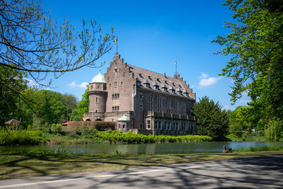 View of temple building against blue sky