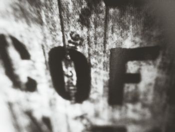 Close-up of text on wall