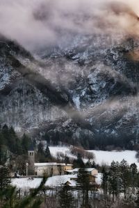 Scenic view of lake against sky during winter