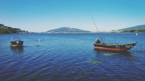 Boats sailing in sea