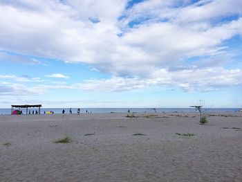 Scenic view of sea against blue sky