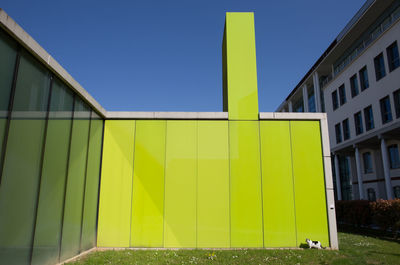 Yellow building against clear sky